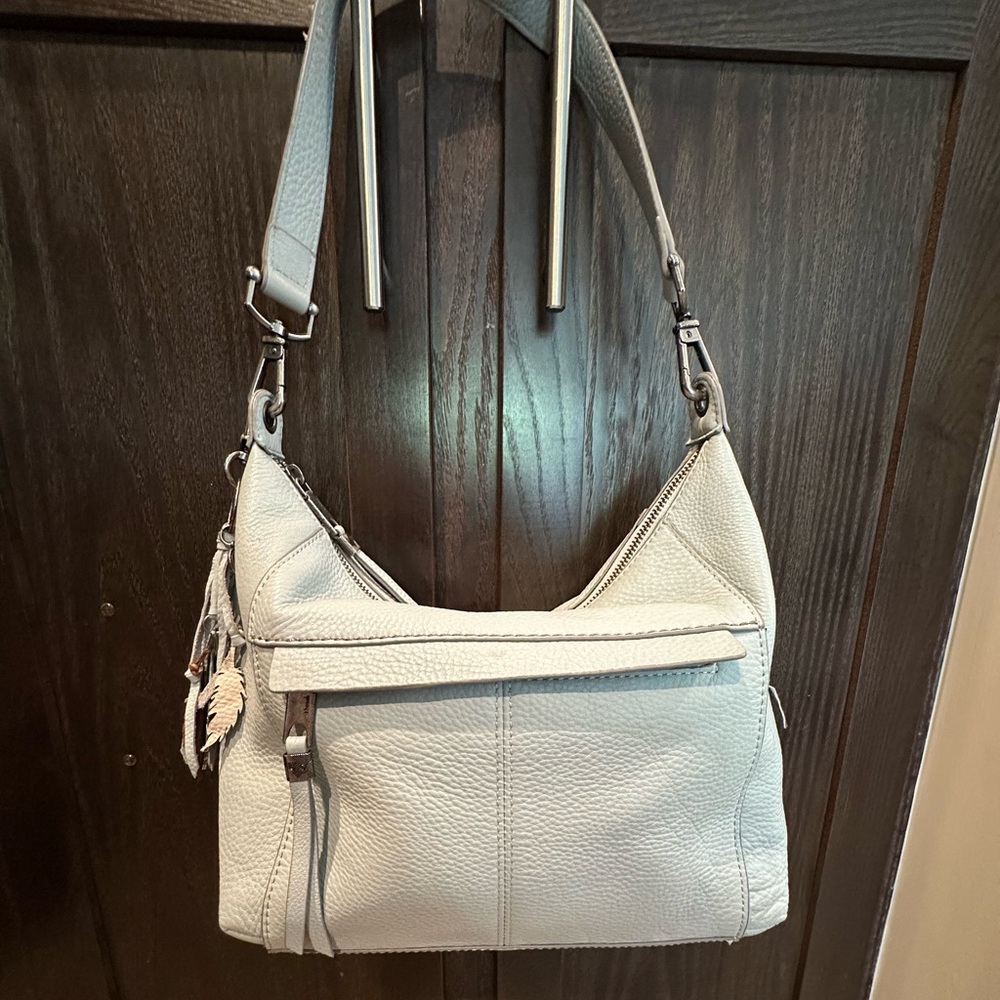 The SAK light blue leather purse